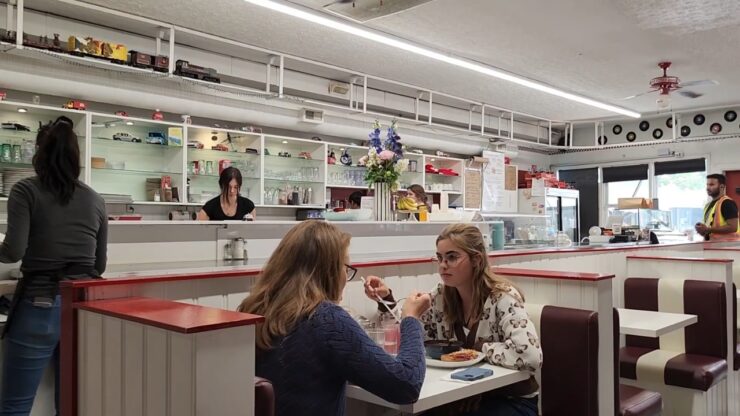 Customers eat inside Evelyn’s Memory Lane Diner in High River