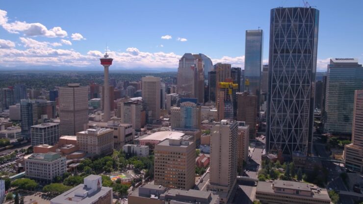 Aerial view of downtown Calgary skyline on a clear summer afternoon